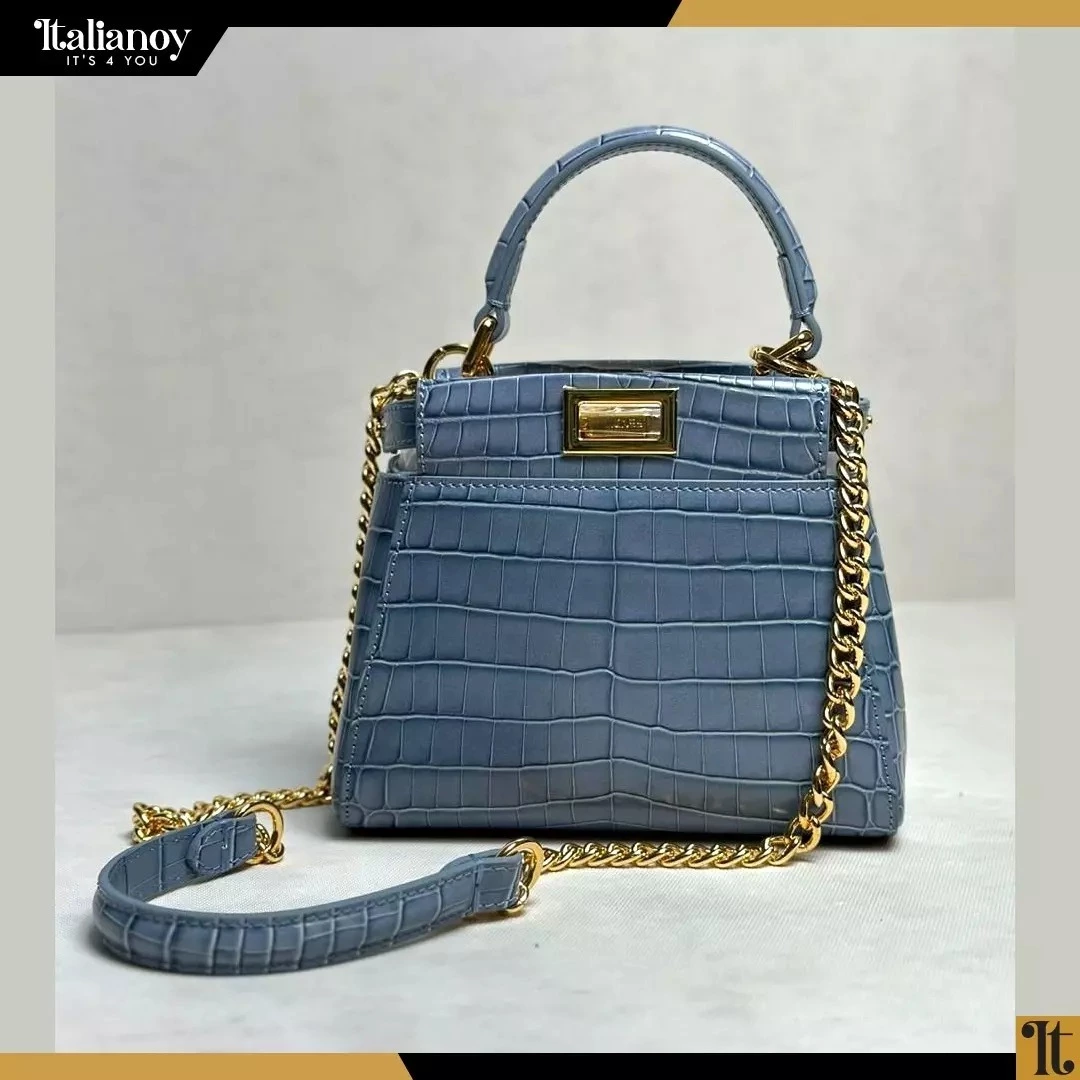 Fendi Peekaboo crocodile leather handbag with top handle.