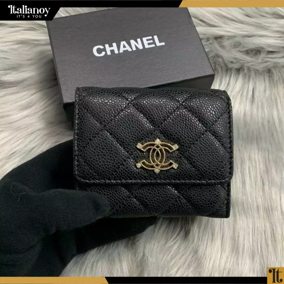 The Chanel Classic Caviar Leather Flap Wallet in Black-gold