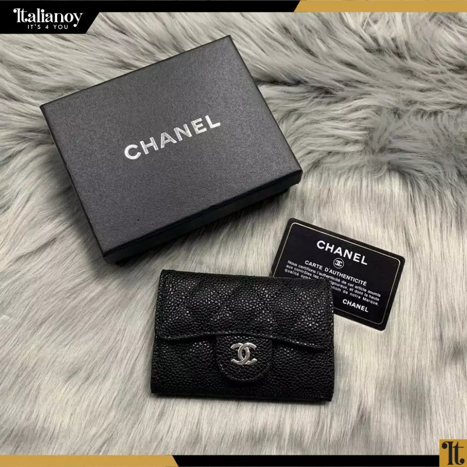 The Chanel Classic Caviar Leather Flap Wallet in Black-silver